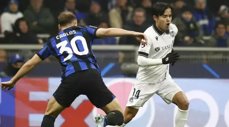 טאקה קובו מול קרלוס אגוסטו (רויטרס) טאקה קובו מול קרלוס אגוסטו