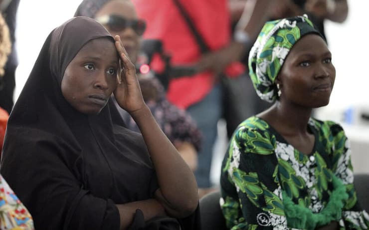 ניגריה טקס 10 שנים ל חטיפת ה נערות מ צ'יבוק אימהות לנערות שנחטפו