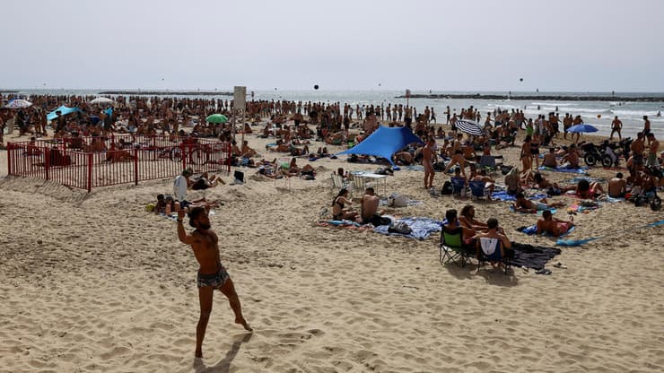 חוף הים בתל אביב (צילום: REUTERS /Hannah McKay) חוף הים בתל אביב