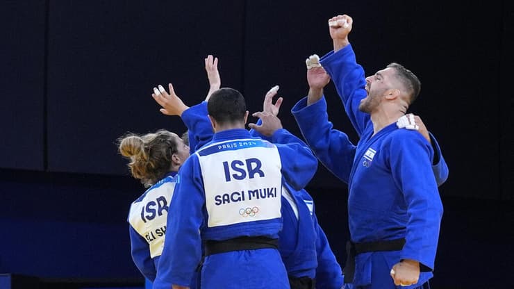 נבחרת הג'ודו הישראלית (AP Photo/Eugene Hoshiko) נבחרת הג'ודו הישראלית
