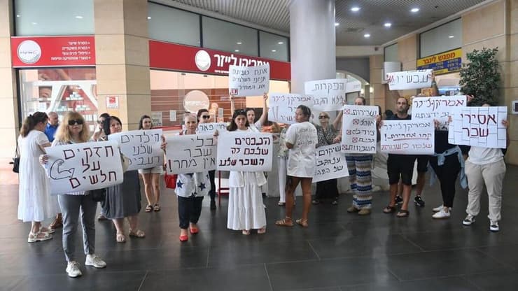 צילום: קובי קואנקס עובדי אמריקן לייזר