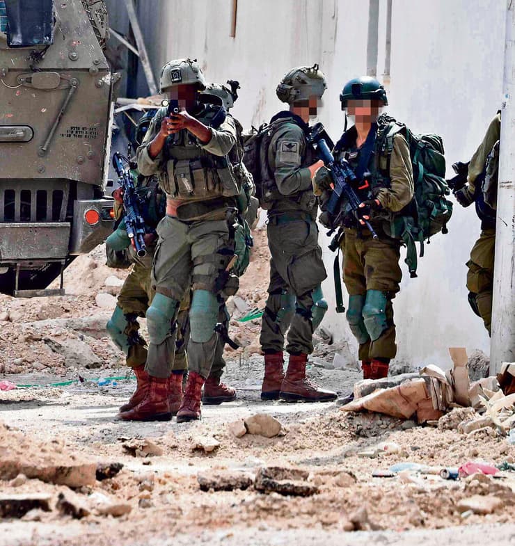 כוחות צה"ל פועלים בגזרת טול כרם, אתמול | צילום: JAAFAR ASHTIYEH , אי־אף־פי yk14056326