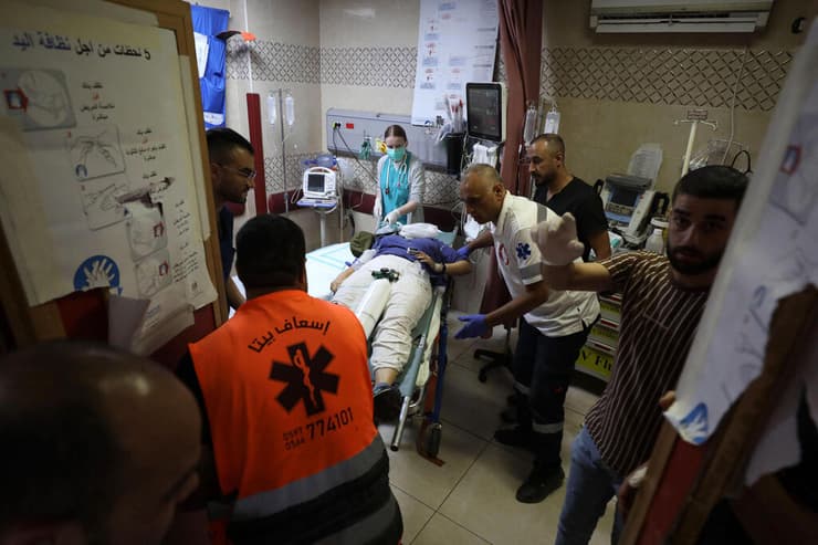 גופת איישנור אזגי אייגי מובלת לבית החולים שכם