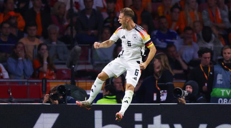 ג'ושוע קימיך חוגג (רויטרס) ג'ושוע קימיך חוגג