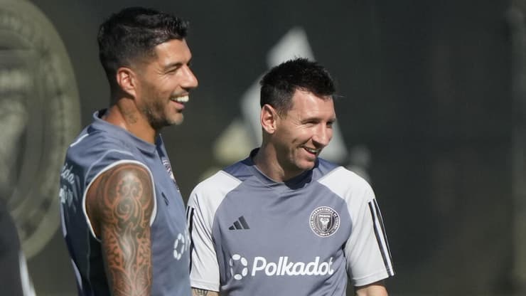 מסי לצד סוארס באימון (צילום: AP Photo/Wilfredo Lee) מסי