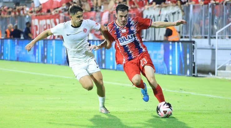 אוהד רבינוביץ' מול רן בנימין