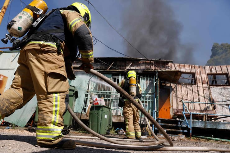 צילום: Jalaa MAREY / AFP פגיעה ישירה במחסני העירייה של קריית שמונה