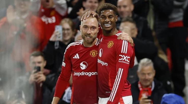 מרכוס רשפורד וכריסטיאן אריקסן מאושרים