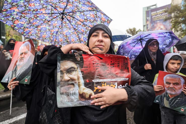 אבל בטהרן (צילום: ATTA KENARE / AFP) הפגנות נגד ישראל בטהרן