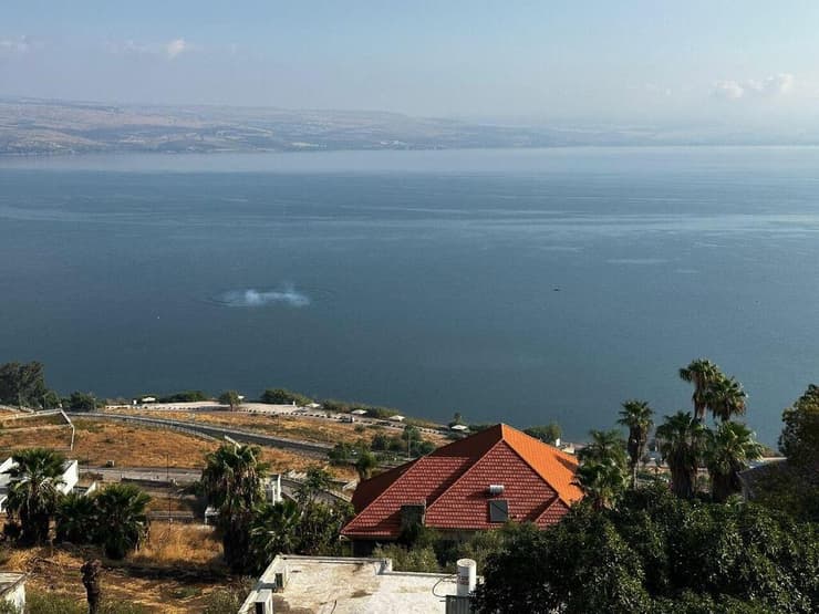 נפילה בכנרת (צילום: מיכאל מועלם) נפילה בכנרת