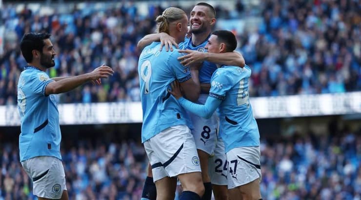 שחקני מנצ'סטר סיטי חוגגים (רויטרס) שחקני מנצ'סטר סיטי חוגגים