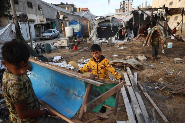 צילום: Eyad BABA / AFP פליט פליטים במרכז רצועת עזה במחנה אל-בורייג'