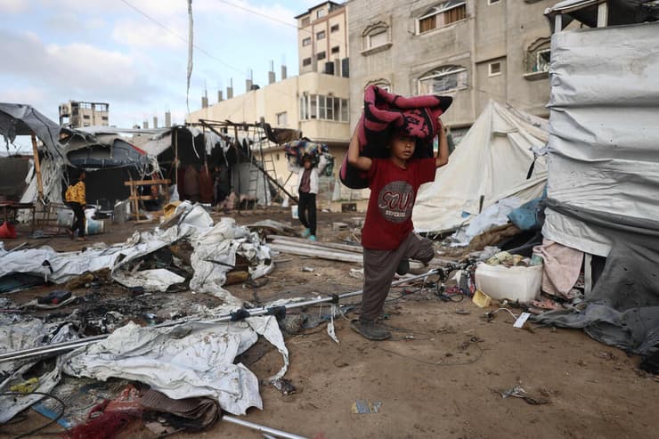 צילום: Eyad BABA / AFP פליט פליטים במרכז רצועת עזה במחנה אל-בורייג'