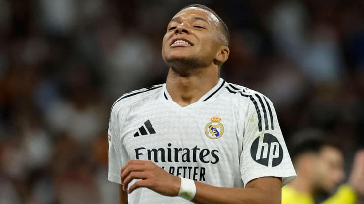 בעין הסערה. אמבאפה (צילום: OSCAR DEL POZO / AFP) אמבאפה