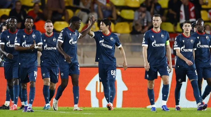 שחקני הכוכב האדום חוגגים (רויטרס) שחקני הכוכב האדום חוגגים