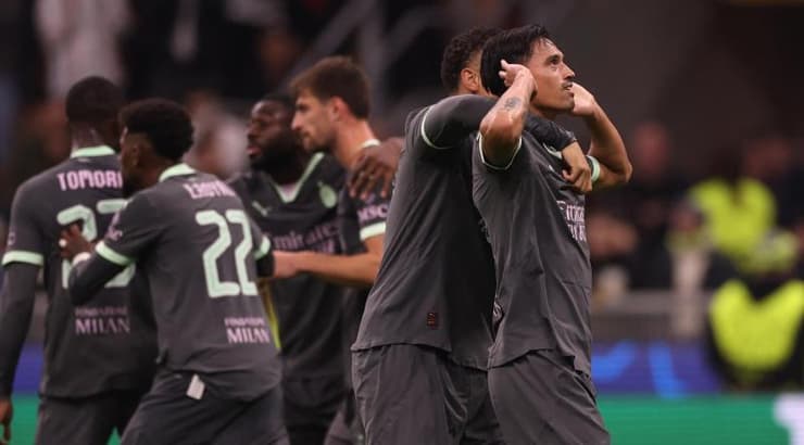 שחקני מילאן מאושרים (רויטרס) שחקני מילאן מאושרים