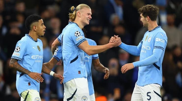 ארלינג הולאנד וג'ון סטונס חוגגים