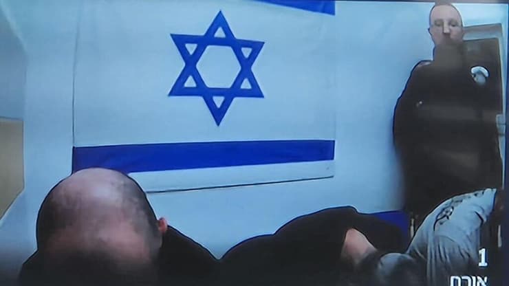 הנאשמים בהעברת מידע לאיראן מסתירים את פניהם