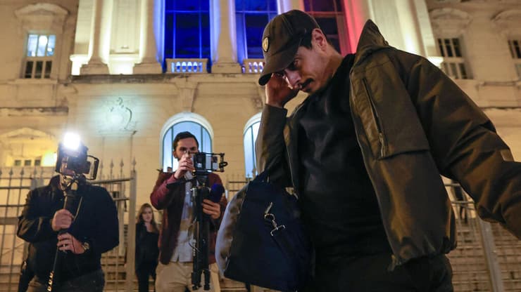 בן ידר מגיע לבית המשפט (צילום: Valery HACHE / AFP) וויסאם בן ידר