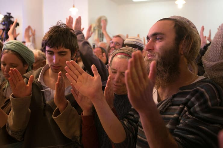 מוחאים כפיים בהלוויית הרב פרומן, 2013