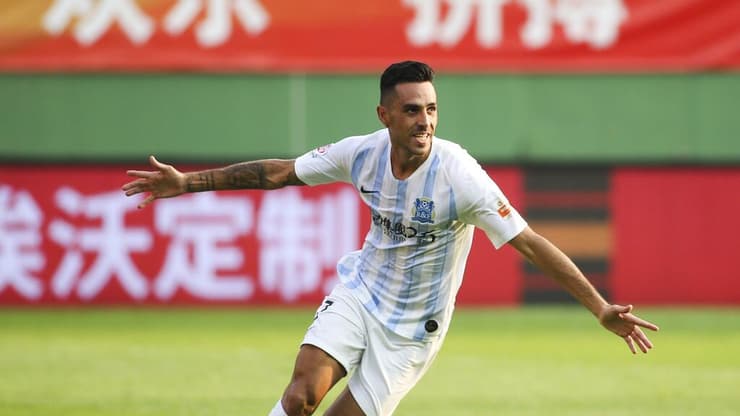 היו ימים. זהבי חוגג במדי גוואנגז'ו (צילום: gettyimages) ערן זהבי