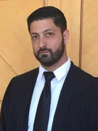 עורך דין מוטי מלניק