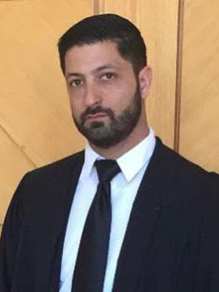 עורך דין מוטי מלניק