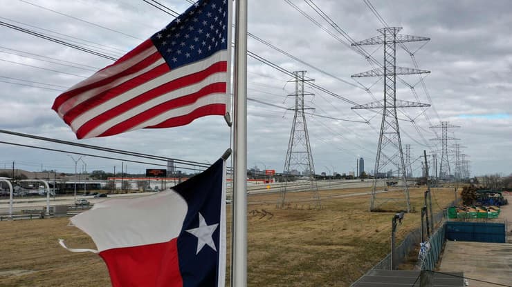 דגלי ארה"ב ו טקסס עמודי חשמל ב יוסטון