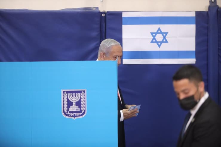 צילום: מארק ישראל סלם ראש הממשלה בנימין נתניהו ורעייתו שרה מצביעים בירושלים