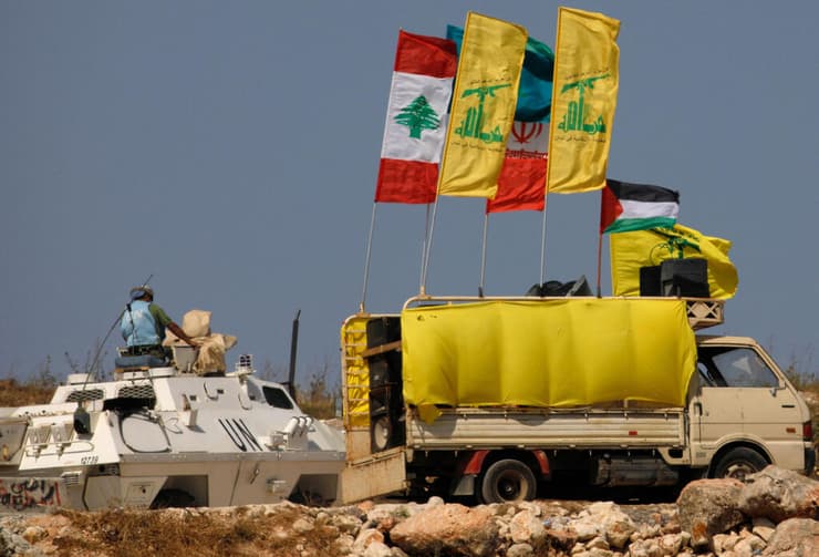 חיזבאללה מעבר לגבול (צילום: AFP) חיזבאללה מעבר לגבול