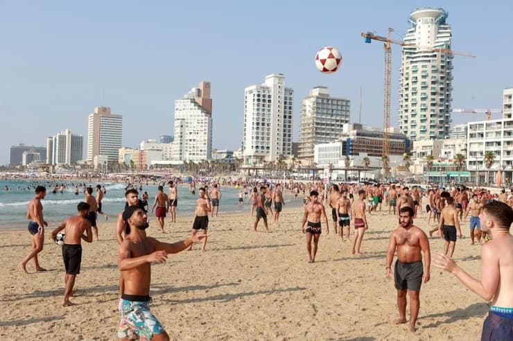 תוכן יומיומי שמראה שישראל היא לא רק מדינת קונפליקט. חופי תל אביב (צילום: עמית שעל ) חופי תל אביב