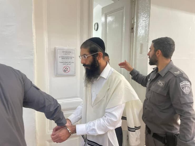 יהושע דדון בהארכת מעצרו (צילום חיים גולדיטש) החשוד בהצתת חנות הסלולר בגאולה בירושלים