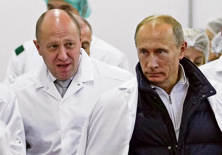 ולדימיר פוטין (מימין) ויבגני פריגוז'ין