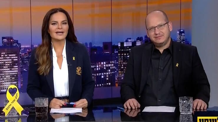 לוינסון לצד אופירה אסייג (צילום מסך, קשת) מתוך "אופירה ולוינסון"