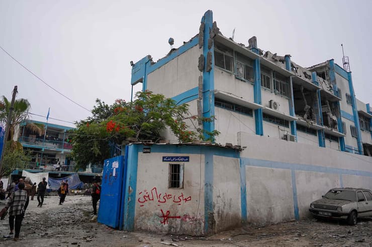 מבנה אונרא בנוסייראת בו התחבאו מחבלים (צילום: Bashar TALEB / AFP) נוסייראת