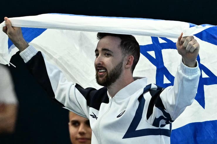 "ממשיך להביא הישגים אדירים למדינת ישראל". דולגופיאט (צילום: Lionel BONAVENTURE / AFP) דולגופיאט