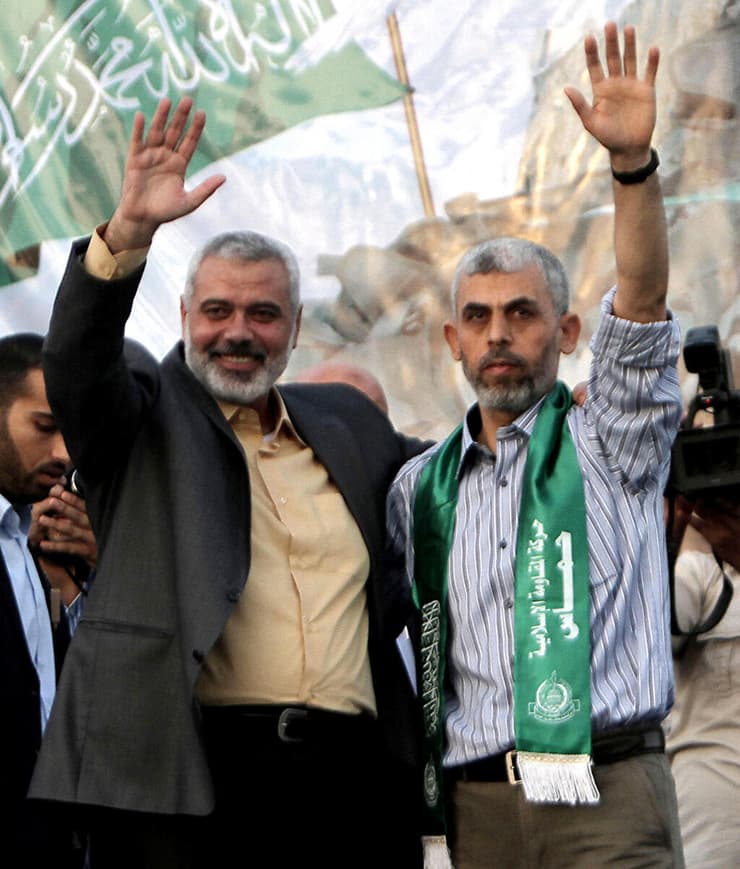 יחיא סינוואר ואסמאעיל הנייה. חוסלו שניהם (צילום: SAID KHATIB / AFP) יחיא סינוואר ואסמאעיל הנייה