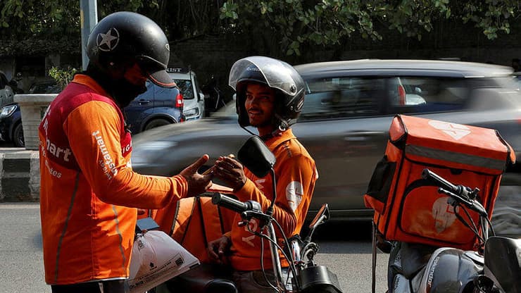 חברת המשלוחים Swiggy (צילום: Reuters/Priyanshu Singh) חברת המשלוחים Swiggy