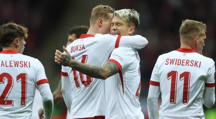 שחקני פולין חוגגים (רויטרס) שחקני פולין חוגגים