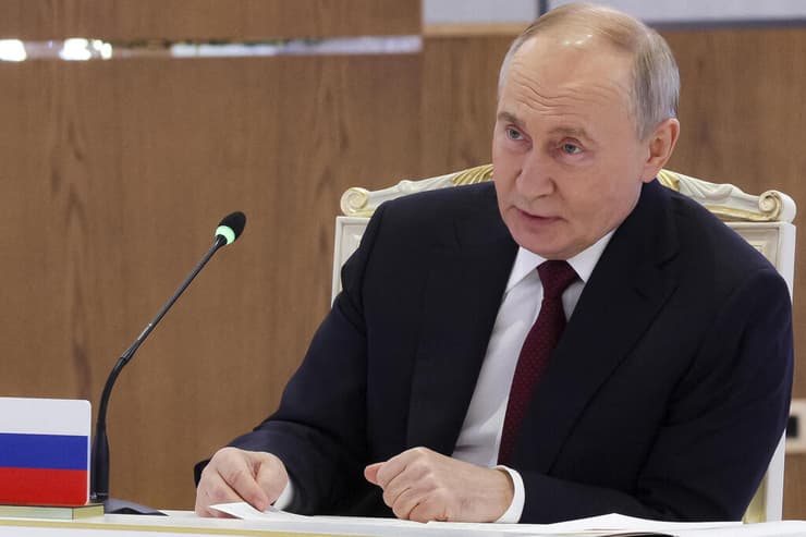 צילום: Gavriil Grigorov, Sputnik, Kremlin Pool Photo via AP ולדימיר פוטין פסגה ביטחונית ב קזחסטן