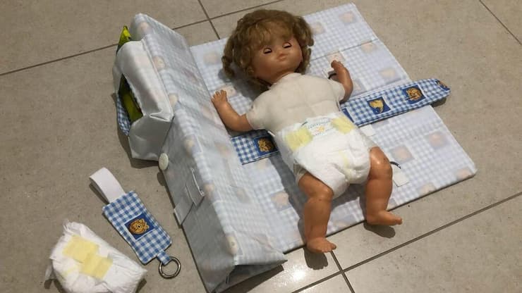 משטח החתלה ביד אחת