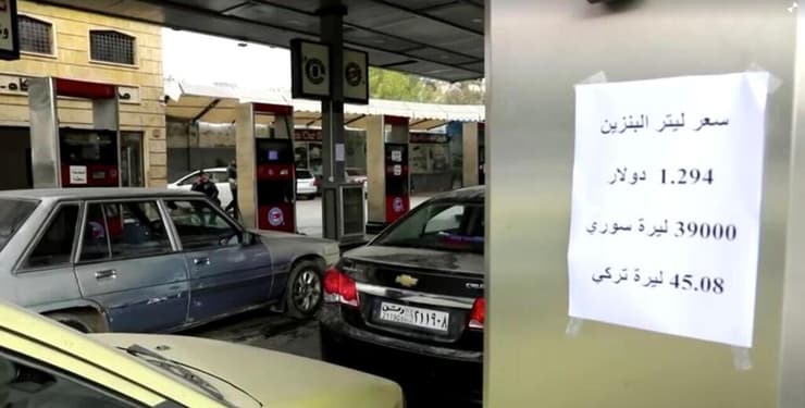 חלב סוריה שלטון מורדים נגד בשאר אסד מחיר מחירון תחנת דלק דולר לירה סורית לירה טורקית