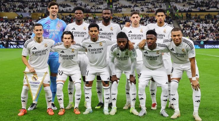 שחקני ריאל מדריד לפני המשחק (רויטרס) שחקני ריאל מדריד לפני המשחק