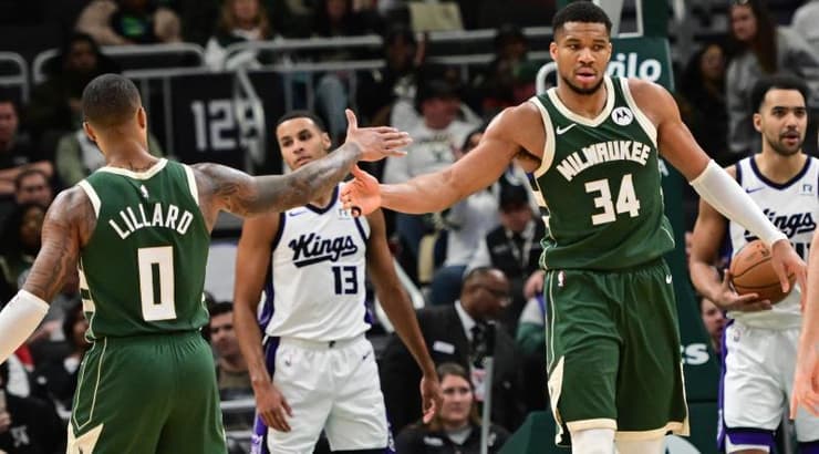 יאניס אנטטוקומפו ודמיאן ליליארד (רויטרס) יאניס אנטטוקומפו ודמיאן ליליארד