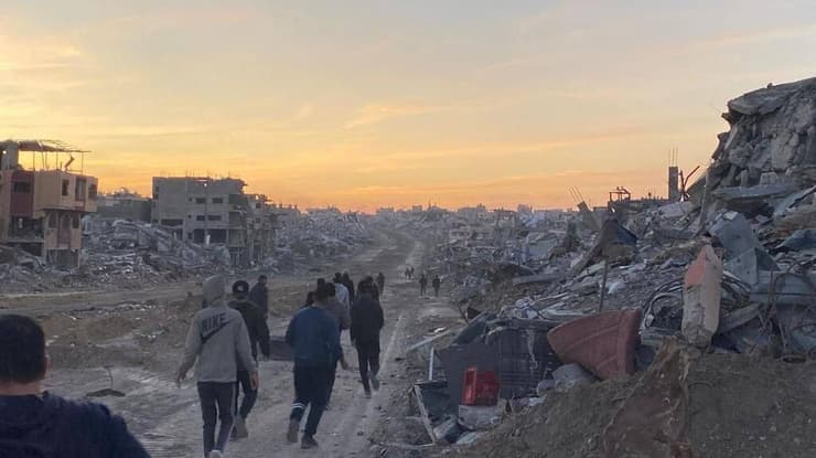 עקורים עזתים חוזרים לבתיהם בג'באליה