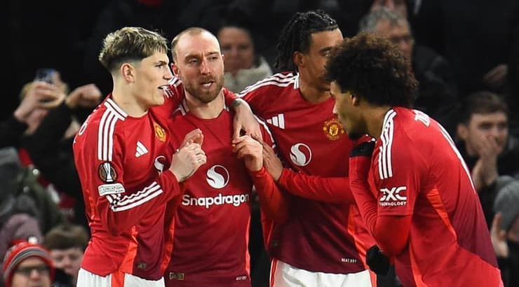 שחקני מנצ׳סטר יונייטד חוגגים (רויטרס) שחקני מנצ׳סטר יונייטד חוגגים