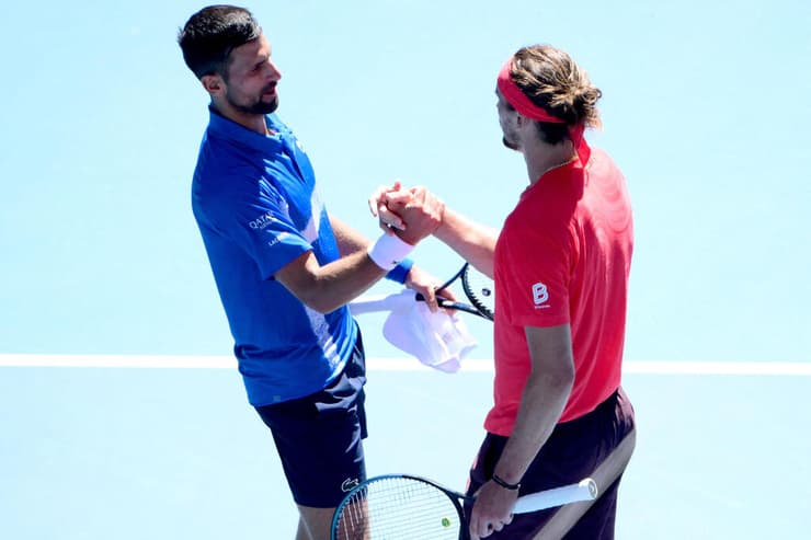 ג'וקוביץ' וזברב נפרדים כידידים (צילום: Yuichi YAMAZAKI / AFP) ג'וקוביץ'