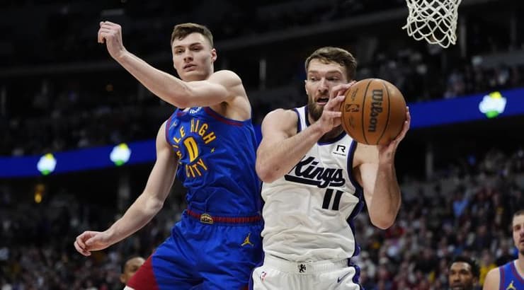 דומנטאס סאבוניס מול כריסטיאן בראון (רויטרס) דומנטאס סאבוניס מול כריסטיאן בראון