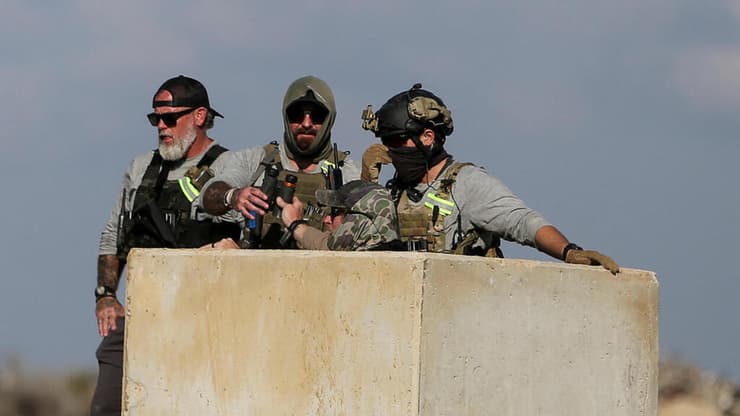 הכוחות הזרים, בנקודת הבידוק (צילום: Photo by AFP) REUTERS/Hatem Khaled רויטרס) כוחות מצריים במעבר מדרום לצפון רצועת עזה