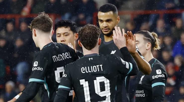 קודי גאקפו ושחקני ליברפול חוגגים (רויטרס) קודי גאקפו ושחקני ליברפול חוגגים